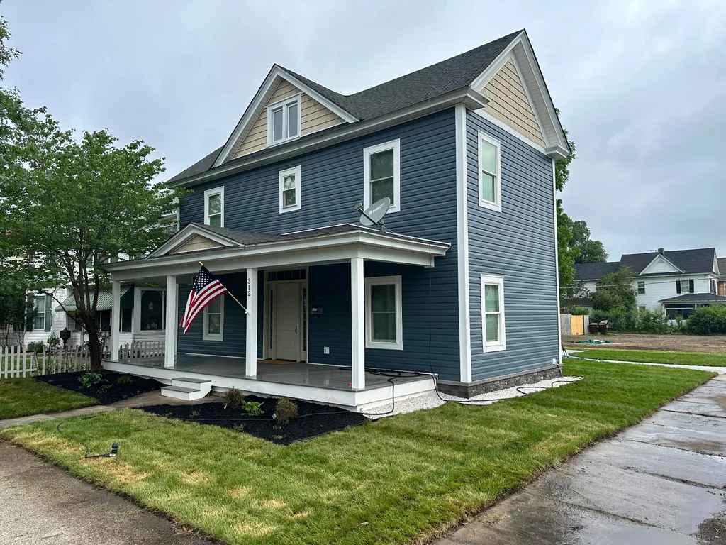Completed siding project in Cambridge MD — full exterior view